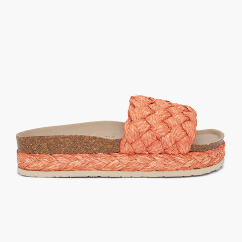 Orange raffia platform sandal with single foot strap and braided sole detail