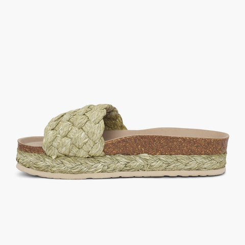 Green raffia platform sandal with single foot strap and braided sole detail