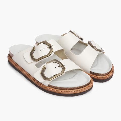 White leather sandals with two foot straps and chunky sole